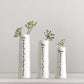 'Love, hope, dream' Trio of porcelain vases