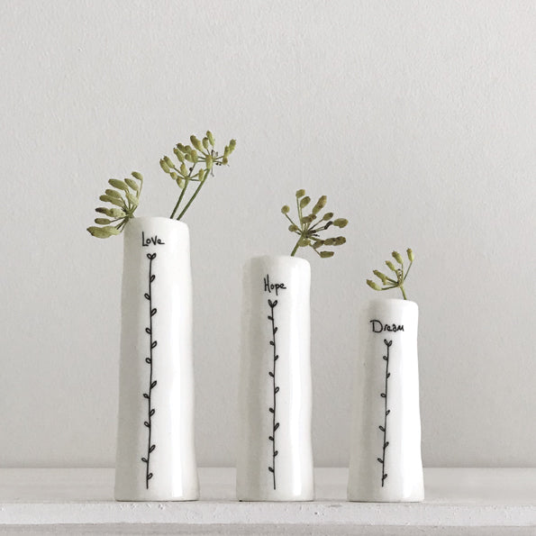 'Love, hope, dream' Trio of porcelain vases